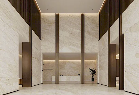 Zweigeschossige Lobby mit Travertin und Bronze